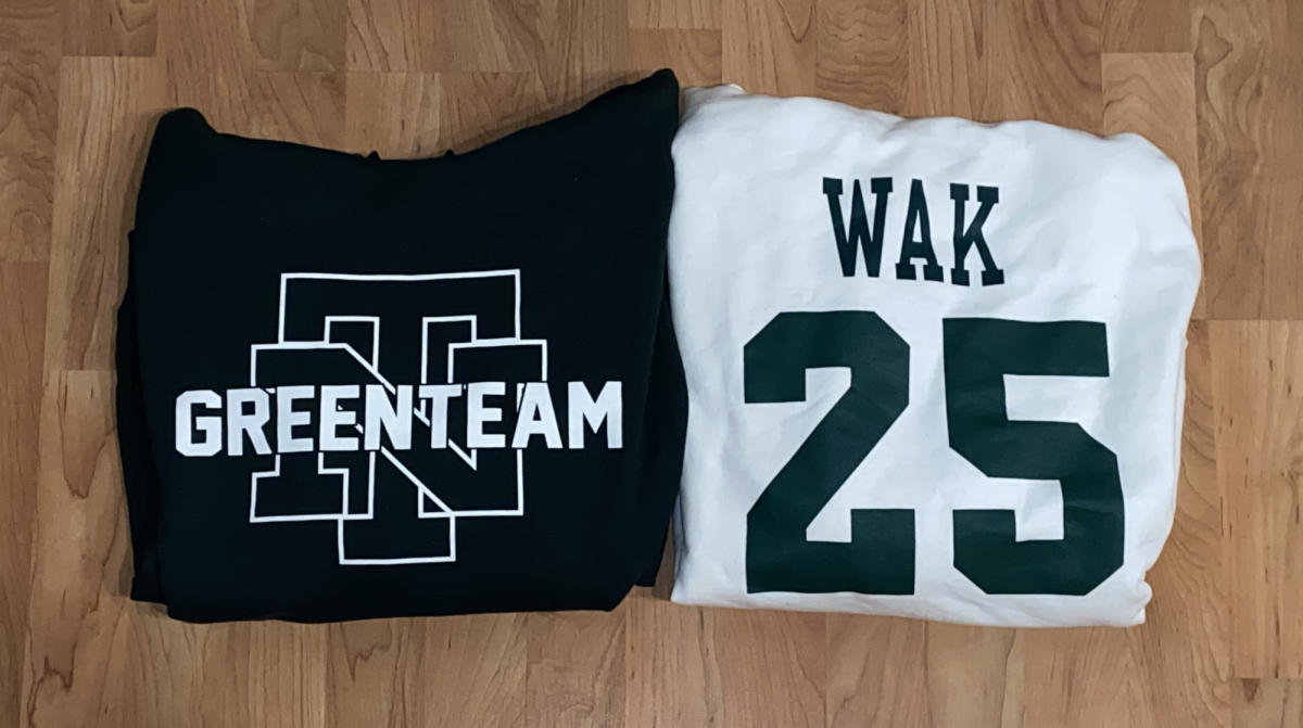 Green and white Green Team sweatshirts with "Green Team" moniker (left) and nickname (right)